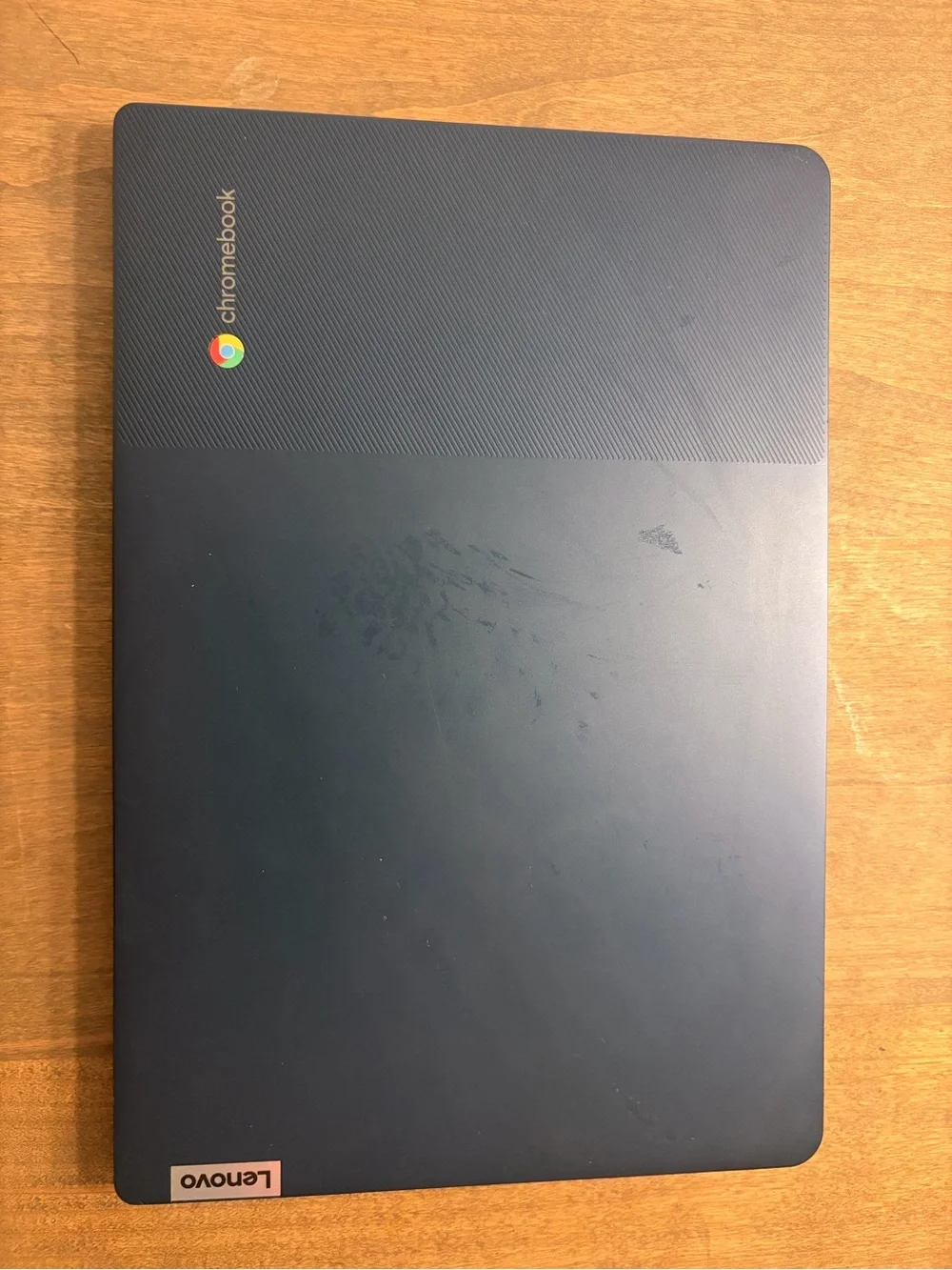 Lenovo Blue Laptop with Dark Gray Keyboard and Trim